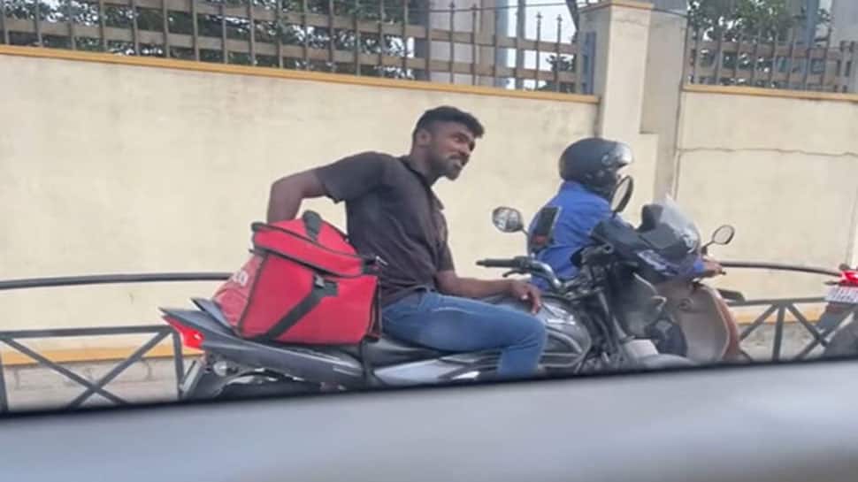 WATCH: Zomato Delivery Guy Seen Eating Customer's Food At Traffic Signal In Bengaluru